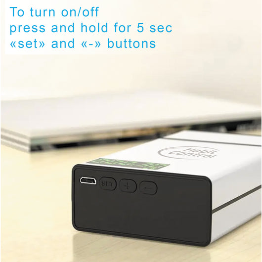 Shows how to turn on/off the Habit Control lockbox. Press and hold the 'Set' and '-' buttons for 5 seconds.