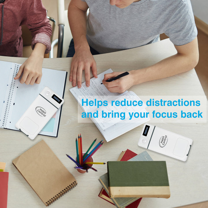 Two people studying at a table with notebooks and pencils, text overlay about reducing distractions 